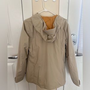 REI women’s tan wind breaker/ rain jacket